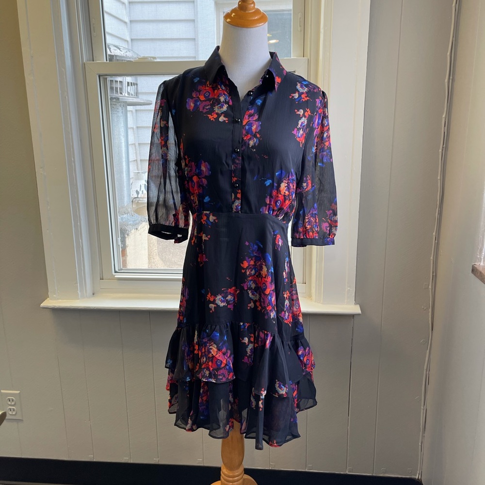 Floral dress. Sleeves are sheer, skirt is fully lined.